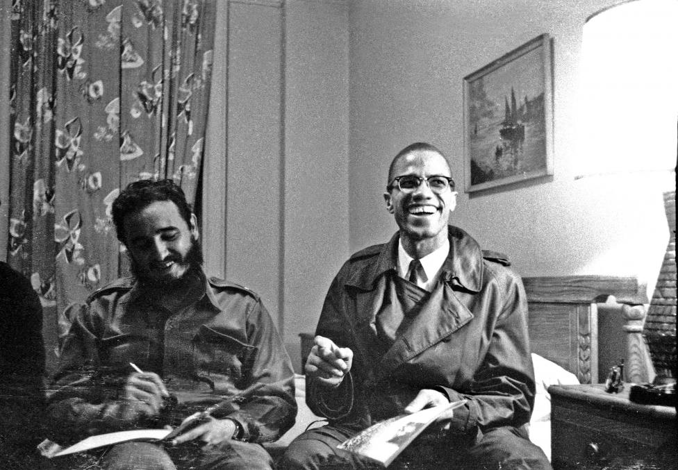 Fidel Castro shares a laugh with Malcolm X at the Hotel Theresa in New York, October 19, 1960. 