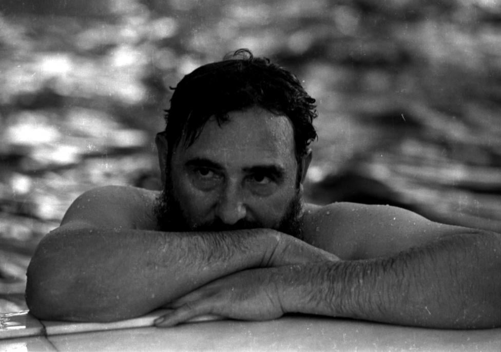 Fidel Castro relaxes in a swimming pool during a visit to Romania, May 28, 1972.