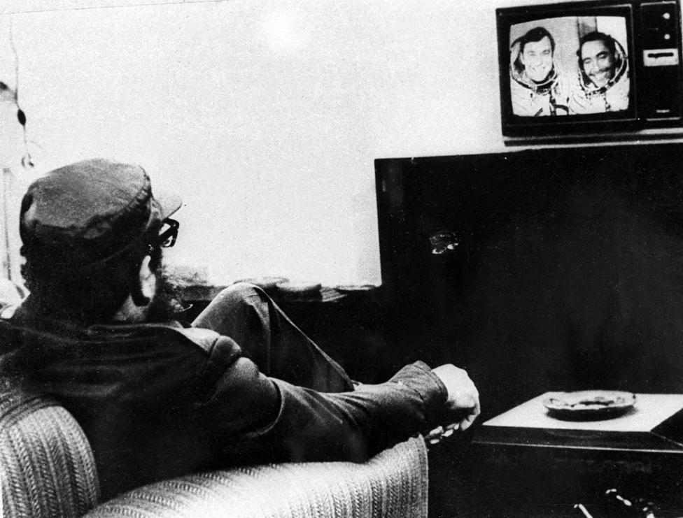 Fidel Castro watches Cuban cosmonaut Arnaldo Tamayo Mendez and Soviet cosmonaut Yuri Romanenko on a television transmission during the Soyuz 38 space mission in Havana September 1980.
