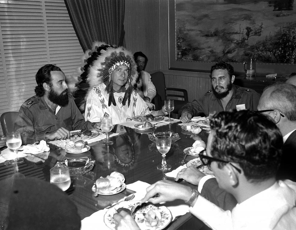 Fidel Castro (R) meets with Reverend W.A.Raifford (2nd-L), chief of the White Birds from the Creek Indians in Havana, July 16, 1959. Raifford gave Castro the name Spiheechie Meeko (Big Warrior Chief).
