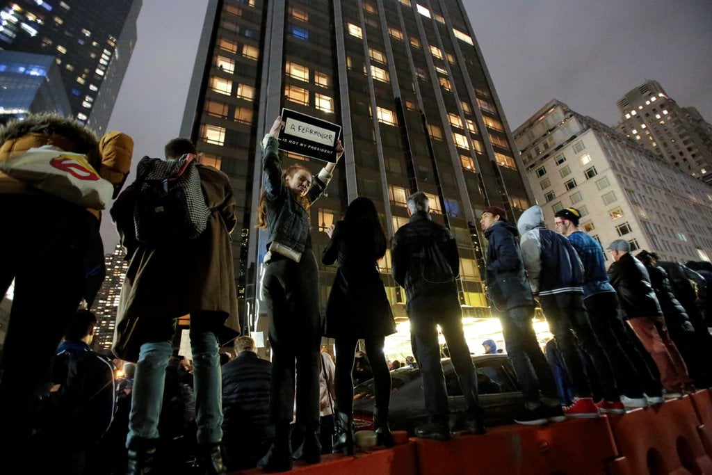 Demonstrators line a fence during a protest outside the Trump International Hotel and Tower following President-elect Donald Trump´s election victory in Manhattan, New York