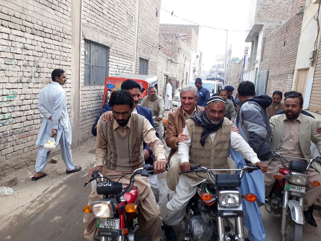 Shah Mehmood Qureshi takes a motorcycle ride through his constituency