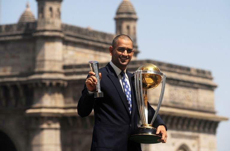 With the 2011 World Cup trophy/AFP