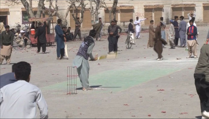 Locals play street cricket in Quetta 