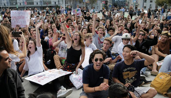 null Students hold a sit-in in front of City Hall protesting the election of Republican Donald Trump as President of the United States in San Francisco, California, US- REUTERS