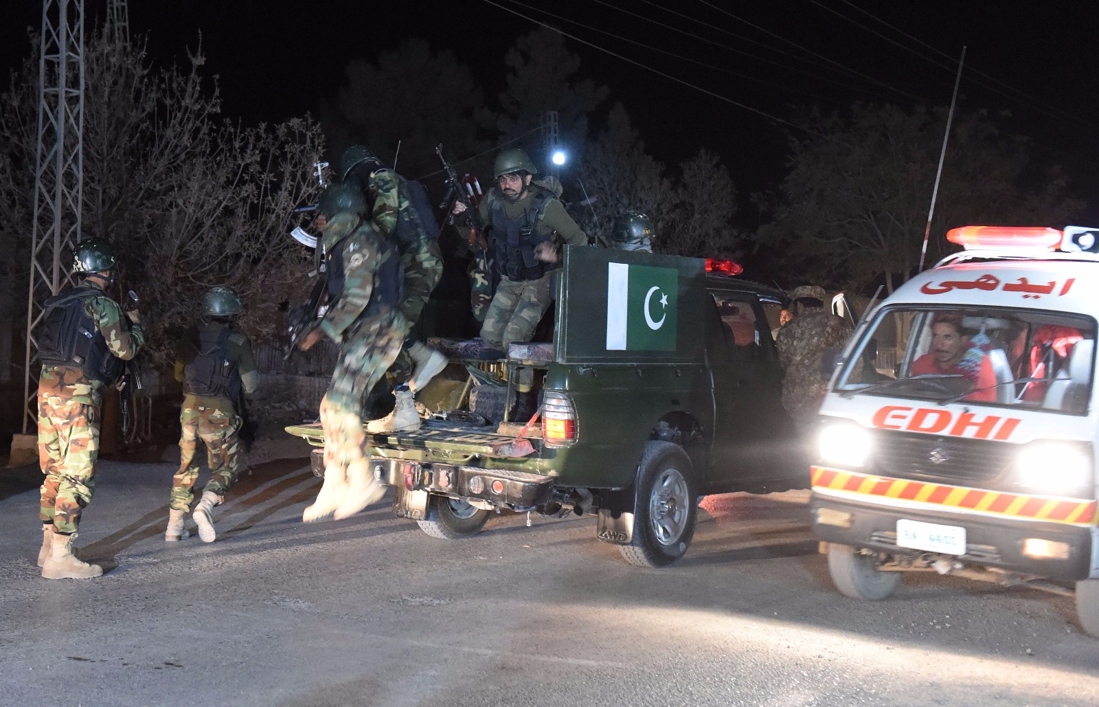 Pakistani army soldiers arrive at the Balochistan Police Training College in Quetta.