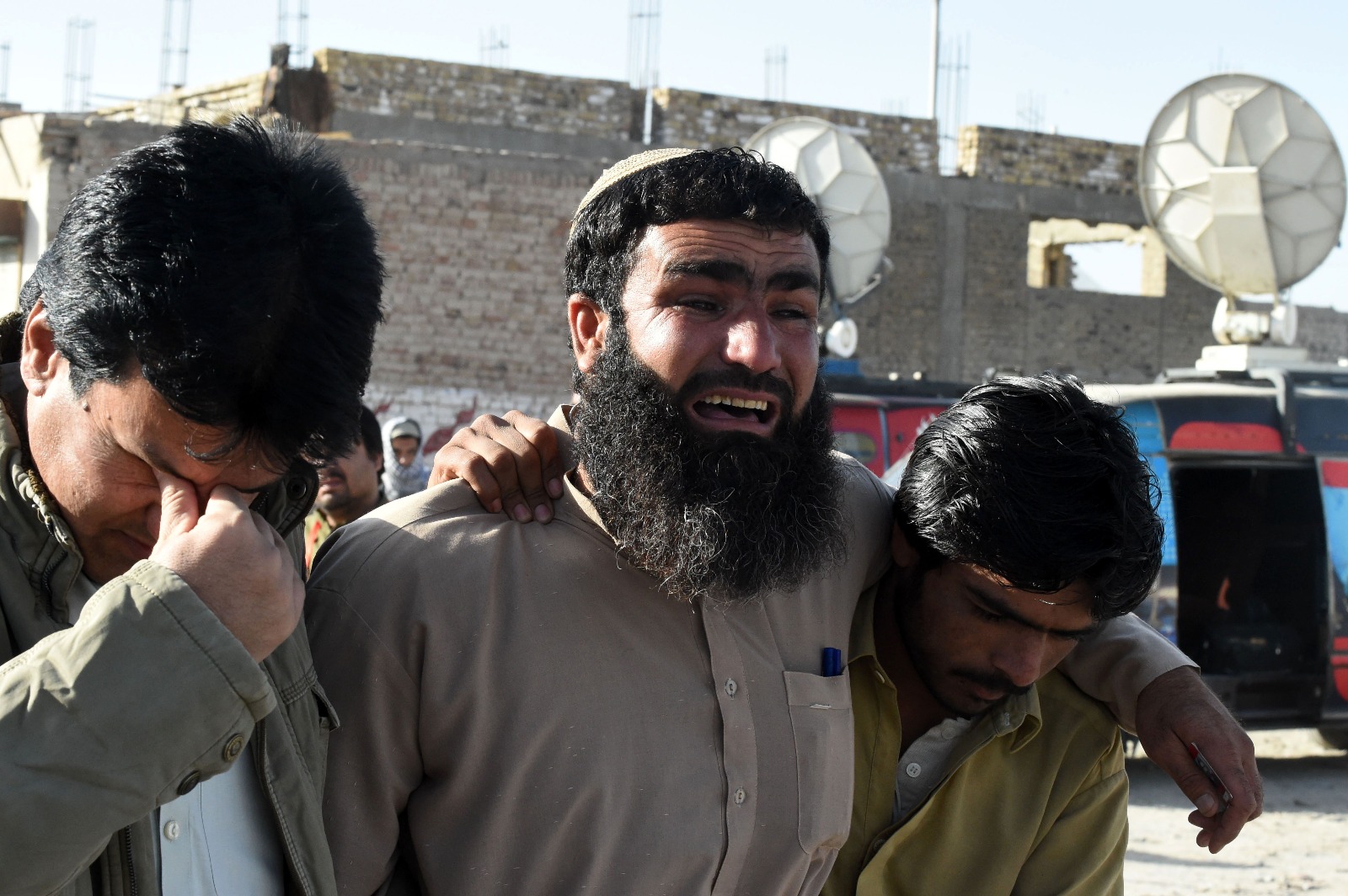 Relatives mourn the loss of family members in Quetta.