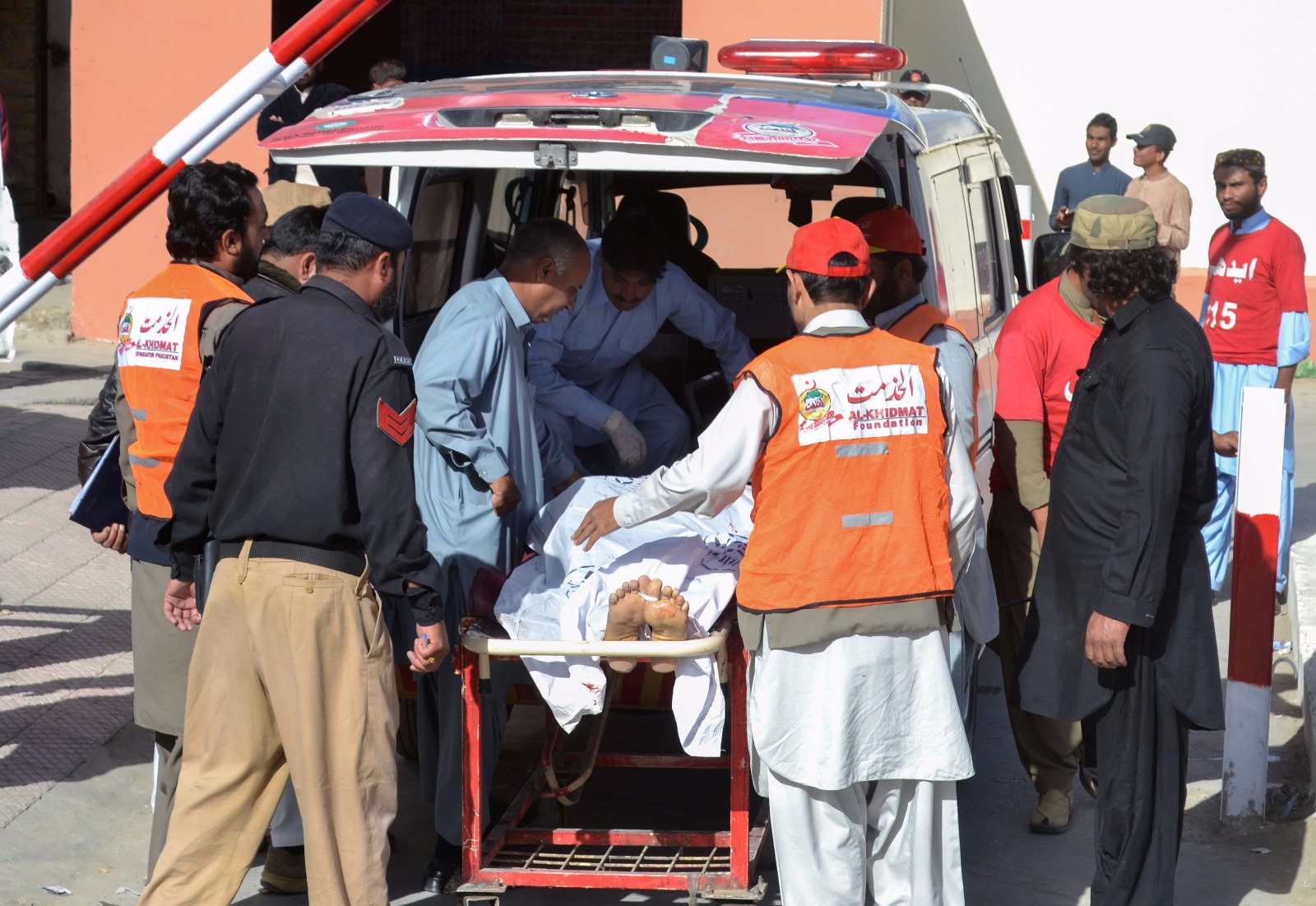 Rescue workers transport an attack victim in Quetta.