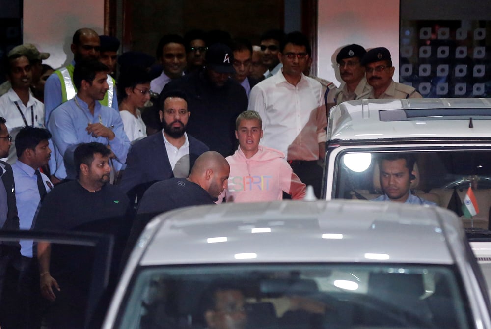Canadian singer Justin Bieber leaves the airport terminal after arriving in Mumbai, India, May 10, 2017. REUTERS/Shailesh Andrade