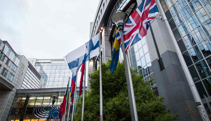 null A picture taken on March 29, 2017 shows British flags at the UK representation to the European Union in Brussels. Britain´s ambassador to the EU Tim Barrow will deliver to Brussels today the letter signed by British Prime Minister Theresa May that will launch Brexit. / AFP / Aurore Belot