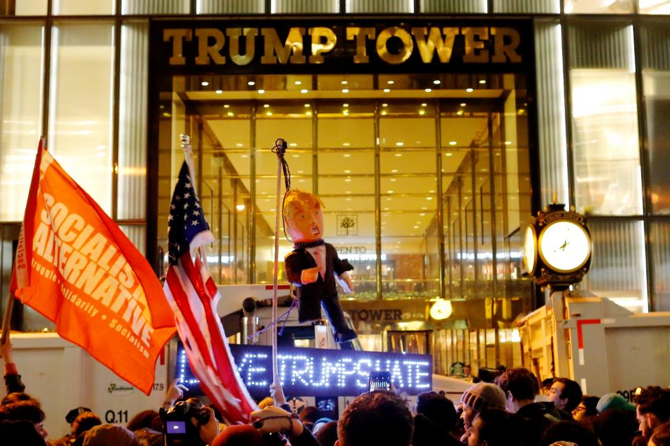 Protesters reach Trump Tower as they march against Donald Trump in Manhattan. 