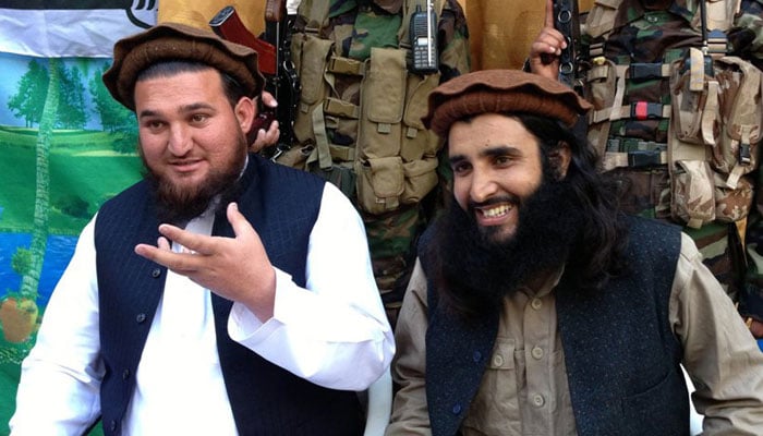 Ehsanullah Ehsan (R) can be seen here with TTP militant commander Adnan Rasheed.—File photo