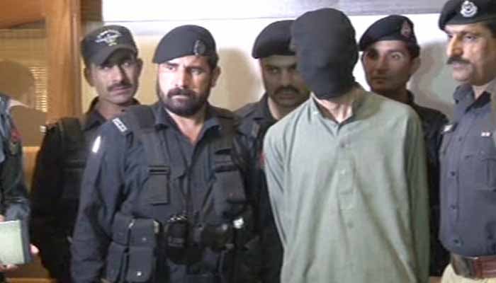 Police present Imran, the alleged shooter of Mashal Khan - Geo News screen grab
