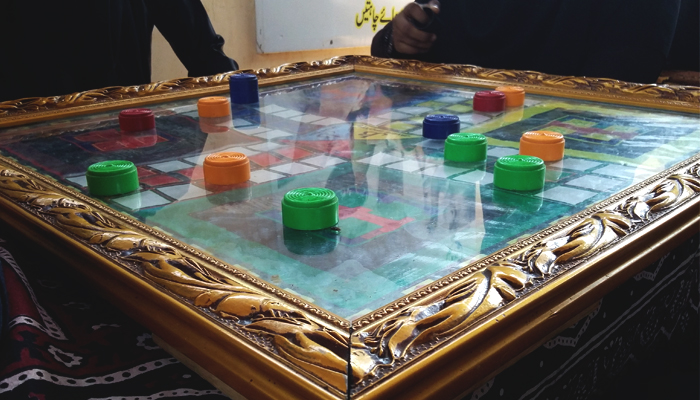 Women playing ludo