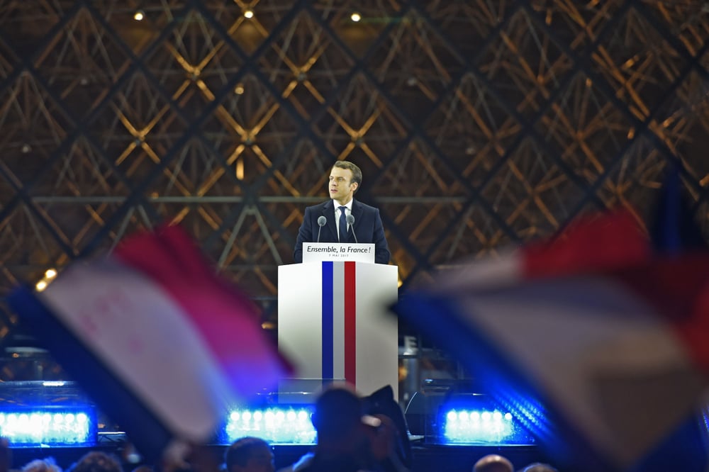 French president-elect Emmanuel Macron delivers a   speech in front of the Pyramid at the Louvre   Museum in Paris on May 7, 2017, following the   announcement of the results of the second round   of the French presidential election. AFP / Eric   FEFERBERG