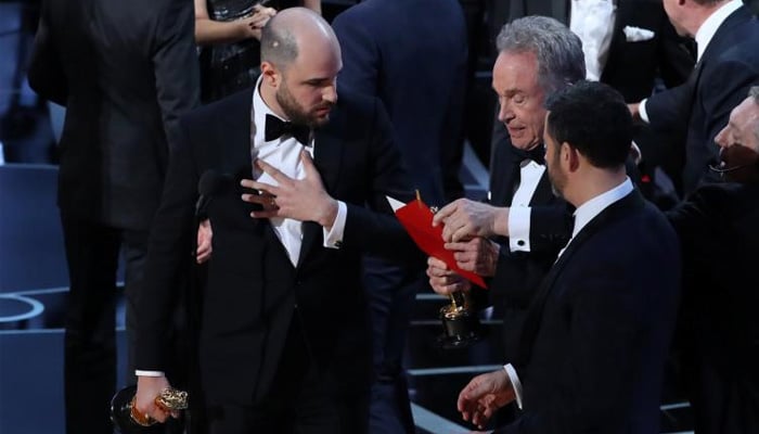 89th Academy Awards - Oscars Awards Show - Hollywood, California, US - 26/02/17 - Jordan Horowitz and Jimmy Kimmel react as Warren Beatty holds the card for the Best Picture Oscar awarded to 