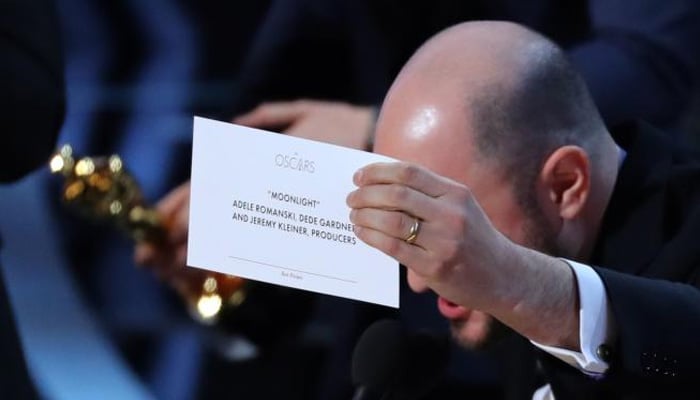 89th Academy Awards - Oscars Awards Show - Producer Jordon Horowitz holds up the card for the Best Picture winner Moonlight. REUTERS/Lucy Nicholson