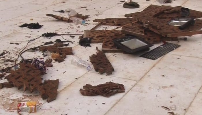 Broken fixtures and dividers lie after the suicide blast at ths shrine of Lal Shahbaz Qalandar in Sehwan Sharif