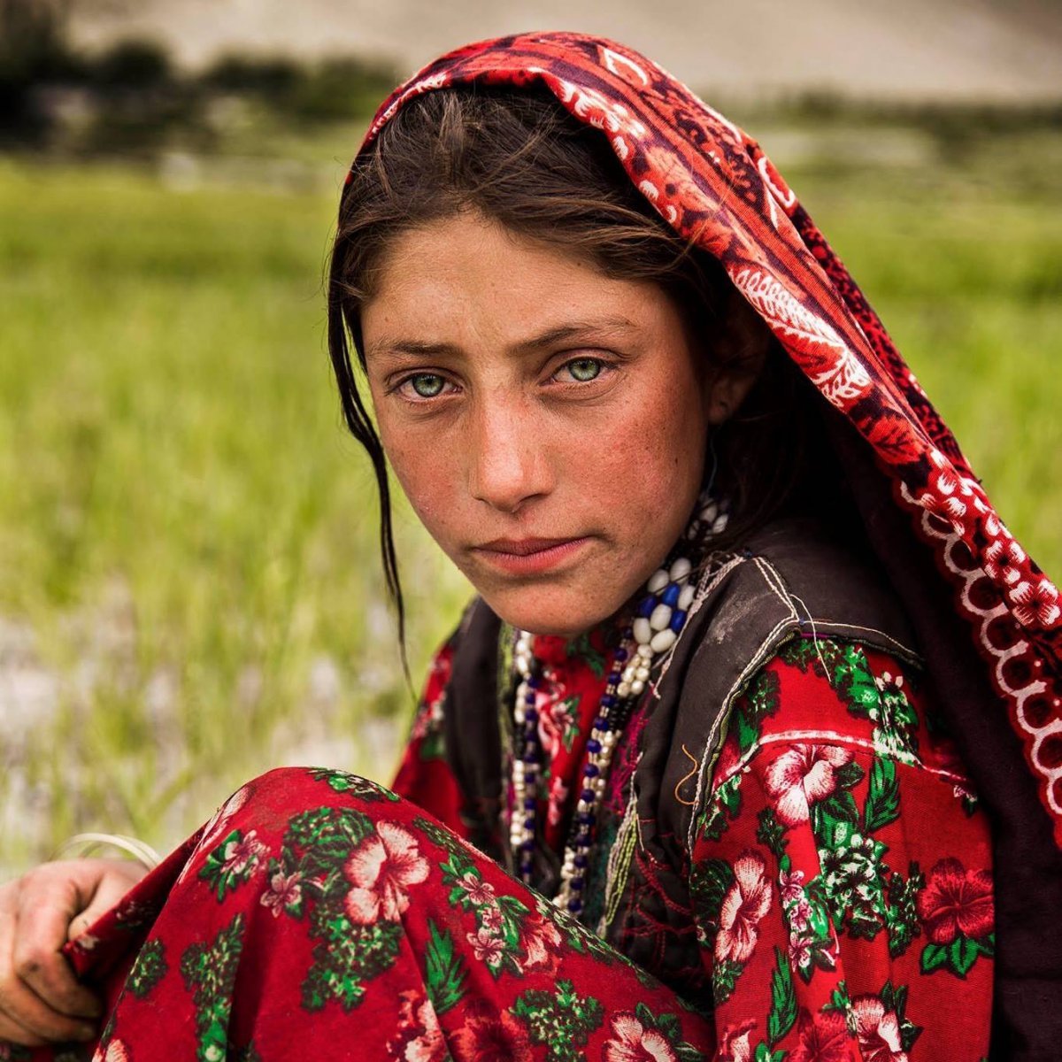 A girl working in the fields of the Wakhan Corridor in Afghanistan photographed by Mihaela Noroc