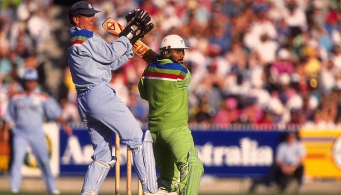 Javed Miandad cuts it on his way to fifty in World Cup final/Getty Images