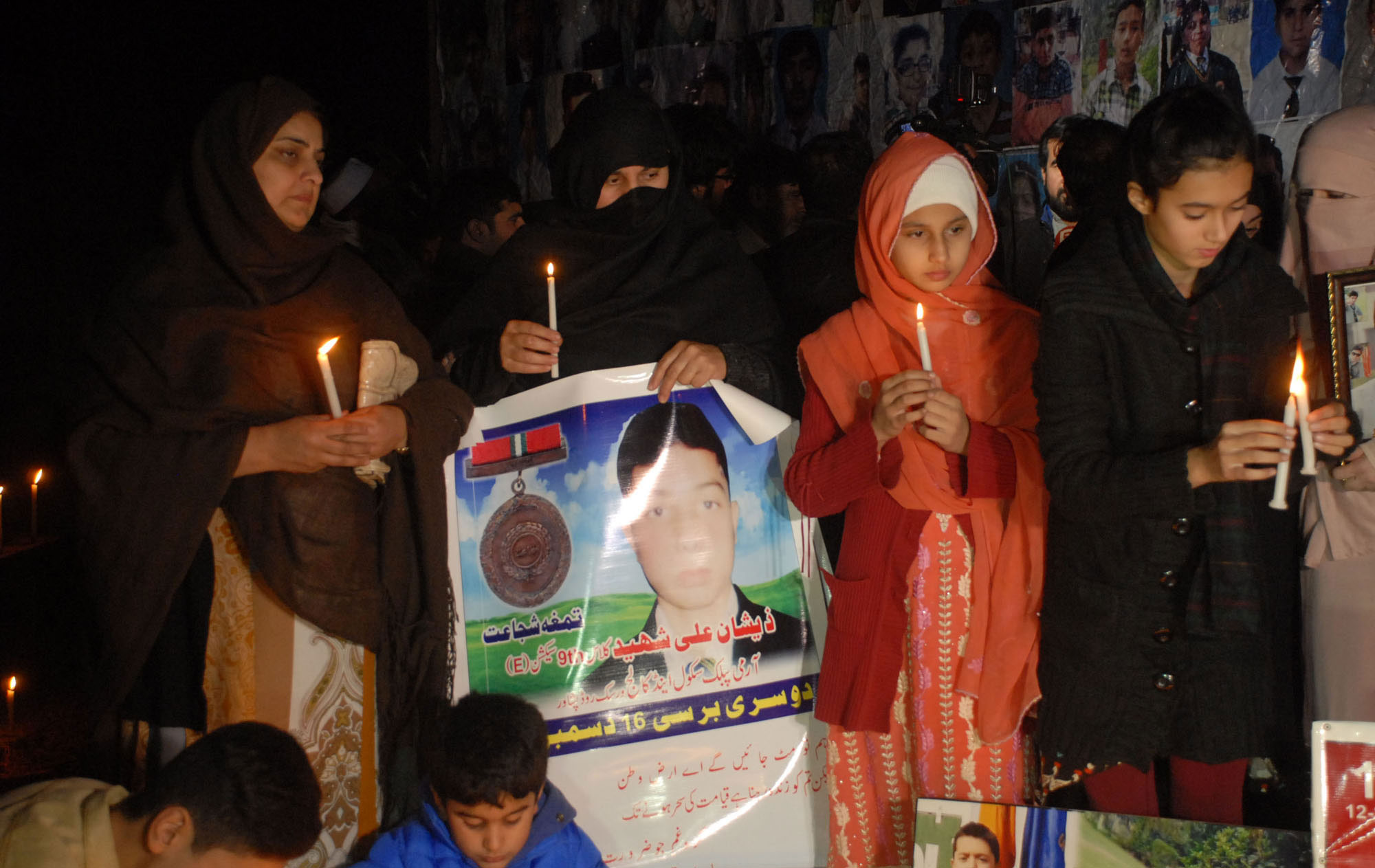 Relatives of students martyred in APS attack hold candlelight vigil on second anniversary of the tragedy at Peshawar Press Club on Dec 15, 2016/PPI