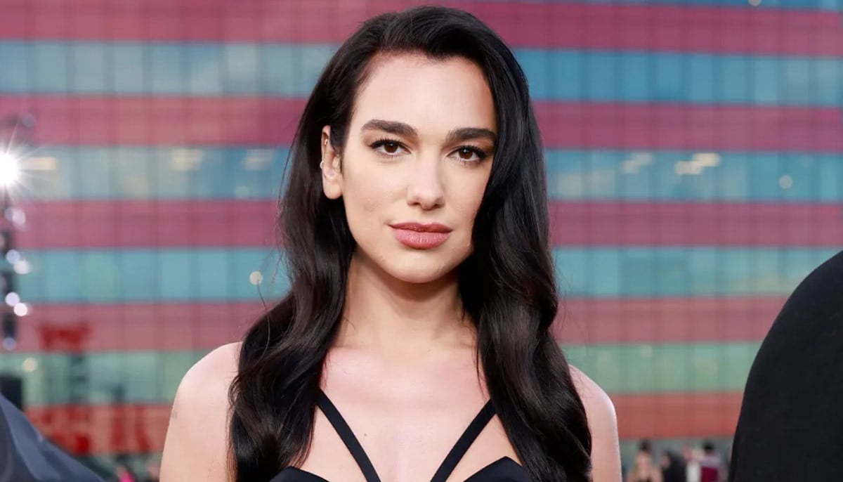 Dua Lipa pouts with director pal after locking major deal