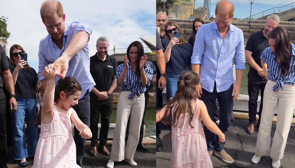 Prince Harry dances with sweet princess as Meghan slips away