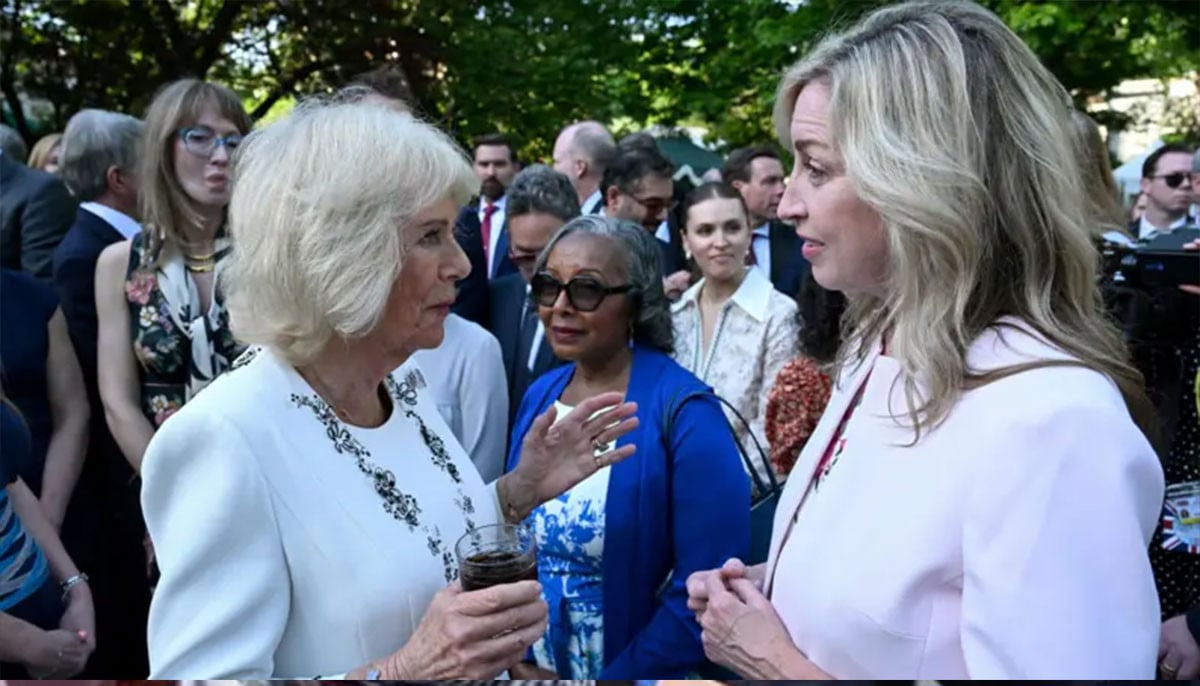 Queen Camilla uses garden party to champion women's safety