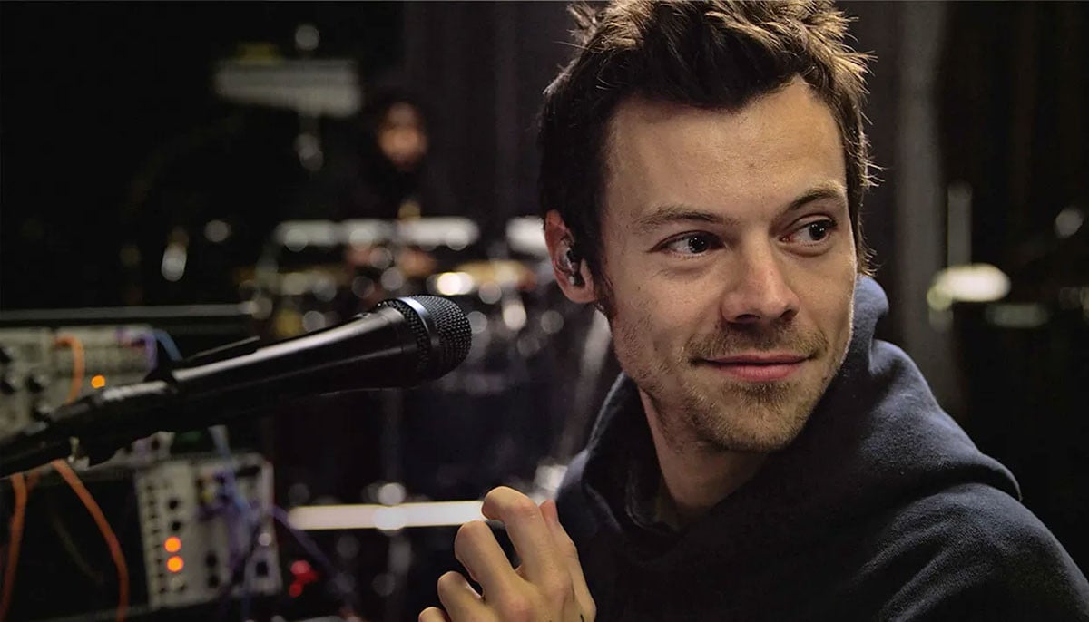 Harry Styles wins over fans with performance of old hit