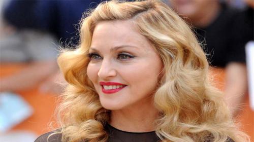 Madonna hits back at Mandela, King ´bondage´ images