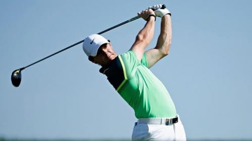 McIlroy mounts late birdie surge in Abu Dhabi opener