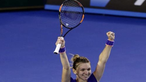 Third seed Halep battles into Open last eight