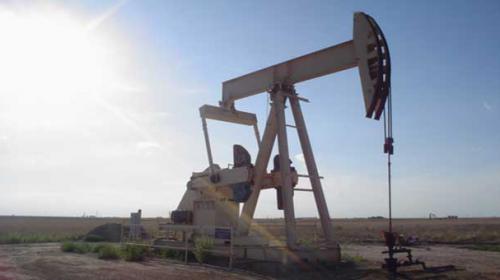 Oil rebounds sharply from six-year lows as dollar eases
