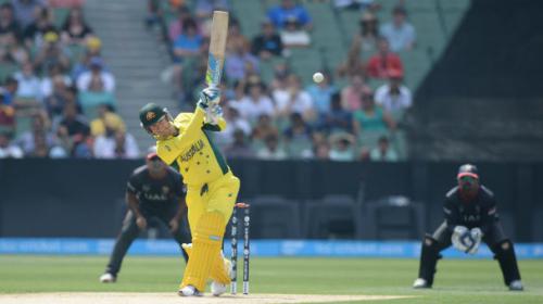 Clarke makes safe return as Australia rout UAE