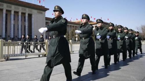 China defence budget rise to defy slowing economy