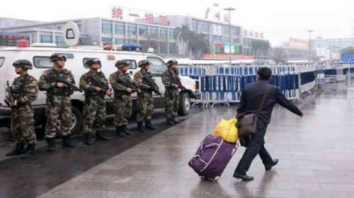 Knife attack wounds 9 at Chinese train station, suspect shot dead