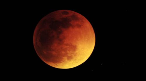 Pacific Rim sky-gazers witness ‘unusually brief’ lunar eclipse