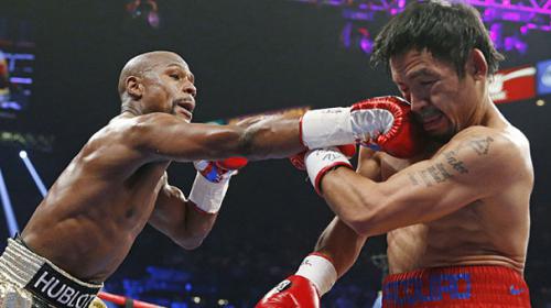 Mayweather defeats Pacquiao in ‘fight of the century’