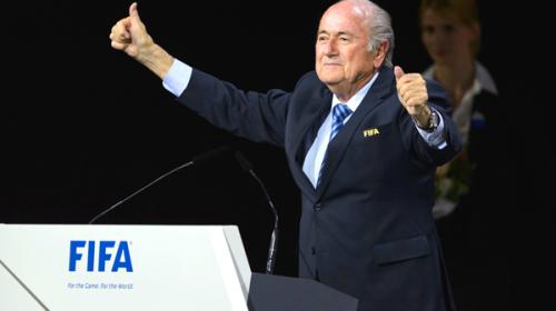 Defiant Blatter wins FIFA vote amid corruption storm