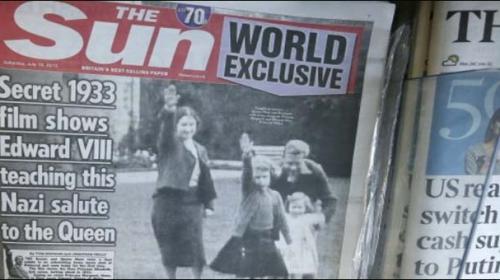 Queen´s Nazi salute as child leaves Britain´s royals red-faced