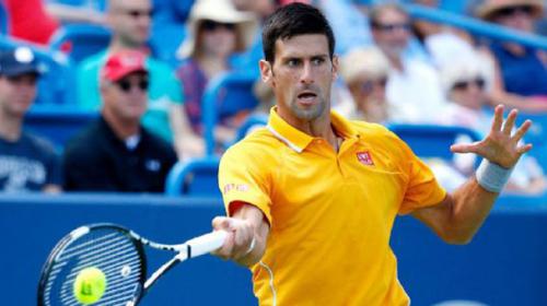 Djokovic survives scare; Serena strolls