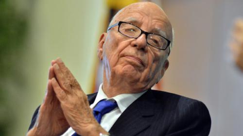 Murdoch says sorry for 'real black president' tweet