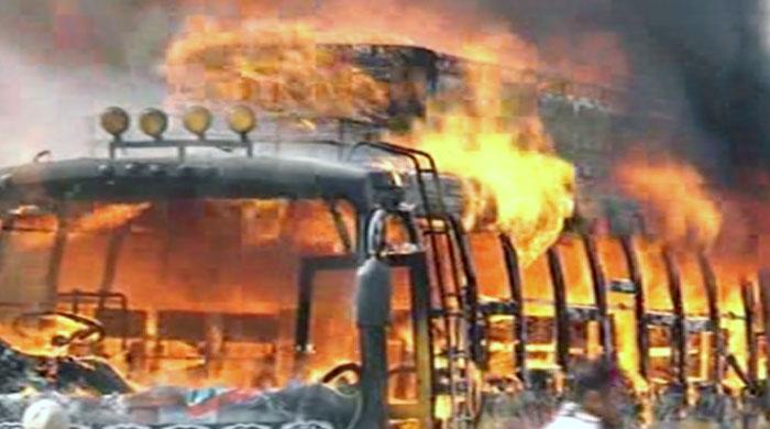 Angry protesters torch BZU bus after driver runs over boy