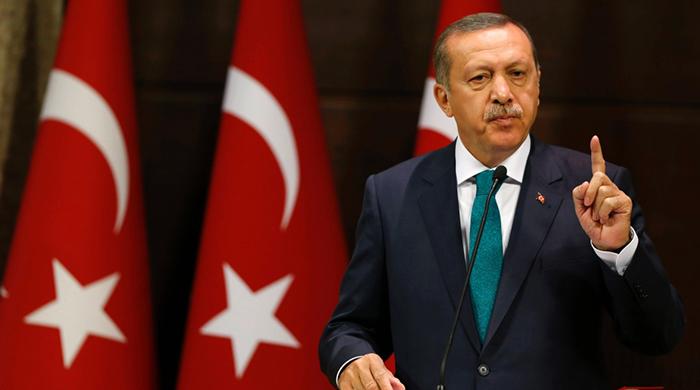 Erdogan defends secularism after remarks by parliament speaker