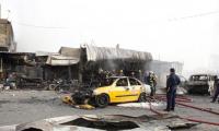 Bomb in Baghdad suburb kills at least 17: police sources