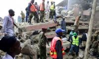 Cries heard as rescuers search rubble of Nairobi building, at least 10 dead