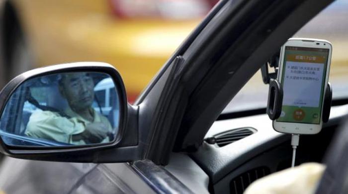 Apple invests $1 billion in Chinese Uber rival Didi Chuxing Apple invests $1 billion in Chinese Uber rival Didi Chuxing