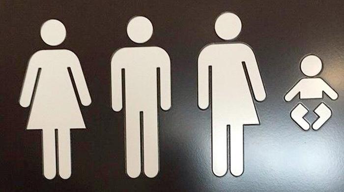 U.S. tells schools to give transgender students bathroom rights
