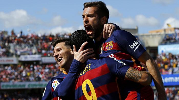 Hat-trick hero Suarez leads Barca to Spanish League title glory