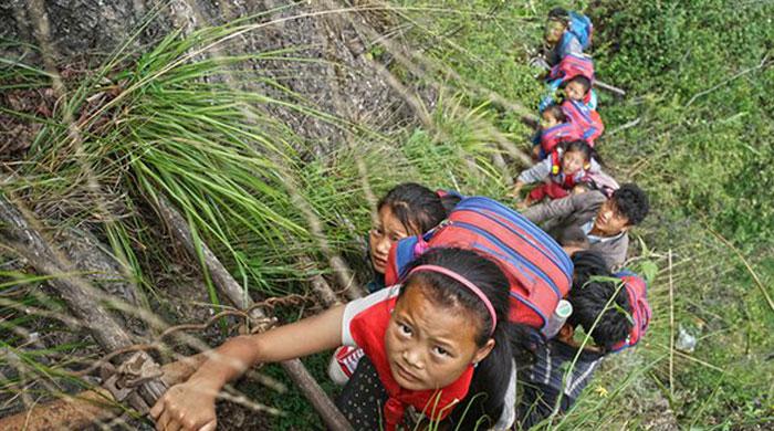 For children in this Chinese village, school is a terrifying mountain climb